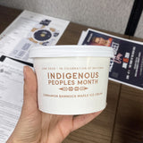 A 12 oz. custom-printed paper food container/gelato cup being held to show printed logo Indigenous Peoples Month. The cups are printed by The Cup Store. 